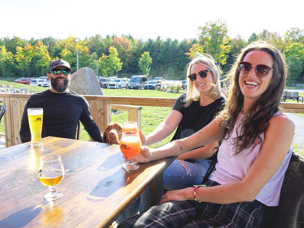 Group of friends grabbing a beer at Quayle's Brewery