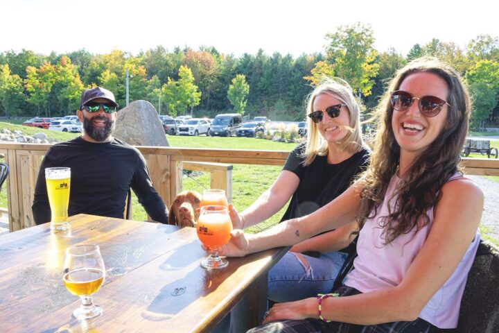 Group of friends grabbing a beer at Quayle's Brewery