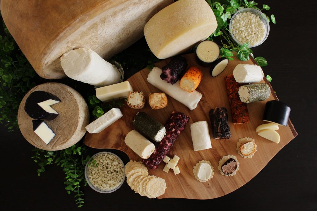 overhead shot of a cheeseboard featuring mariposa dairy cheese