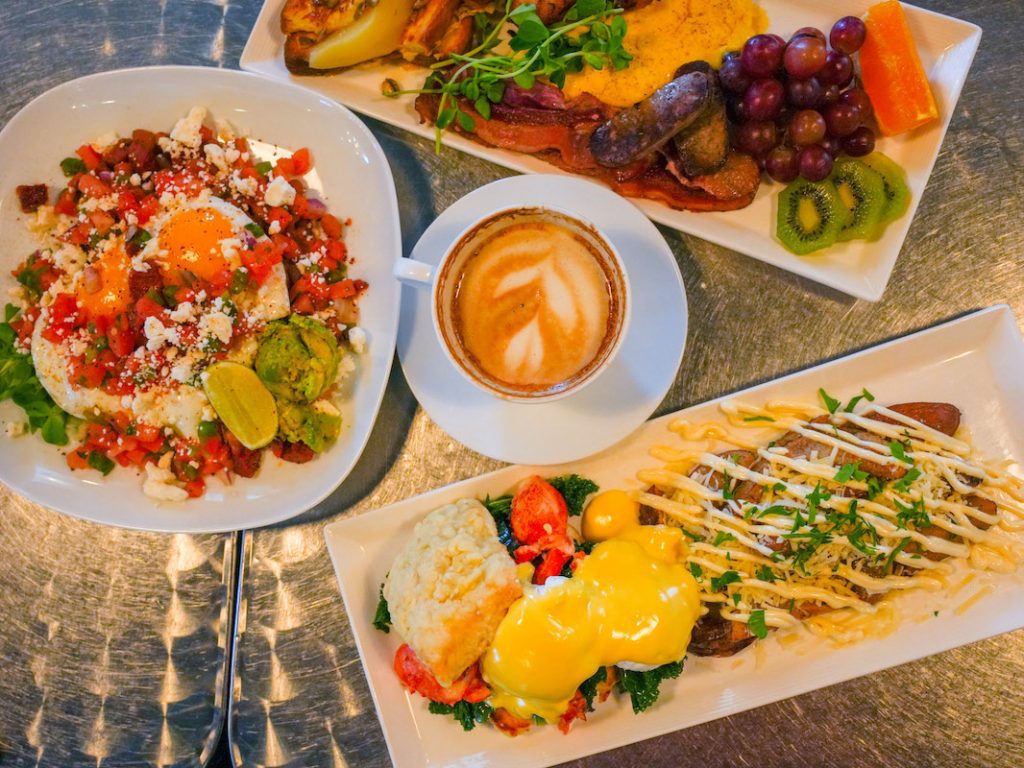 overhead shot of brunch at revalee cafe on metal table