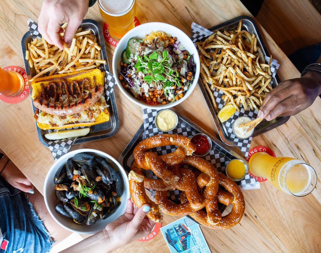 overhead shot of food and beer at Royal City Brewing