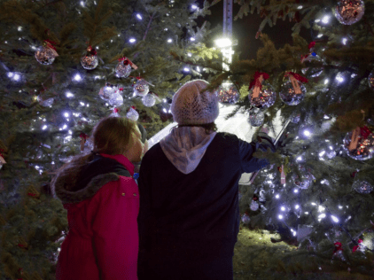 Two Children by Christmas Tree with Memory Balls