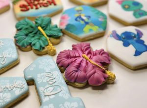 cookies iced in a Lilo and Stitch theme for a first birthday