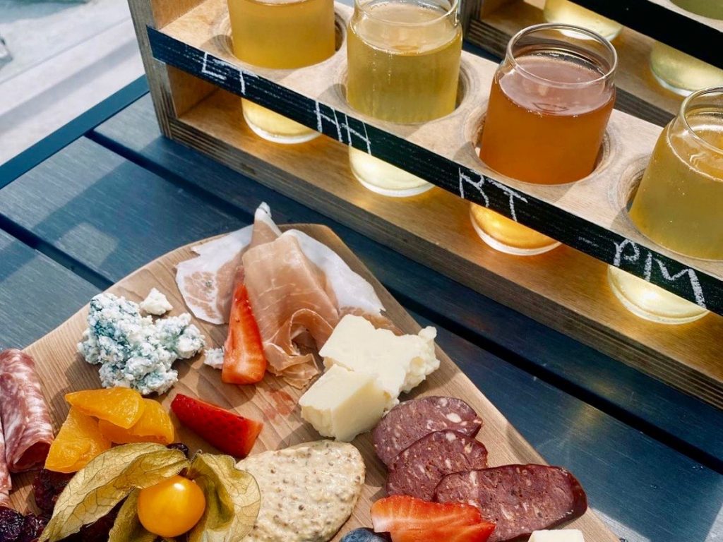 charcuterie board and flight of cider at Slabtown