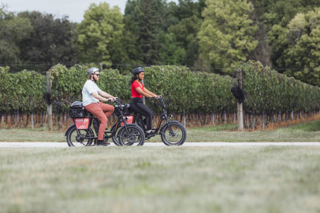 riding a bike by the vineyards at Viewpointe Estate Winery