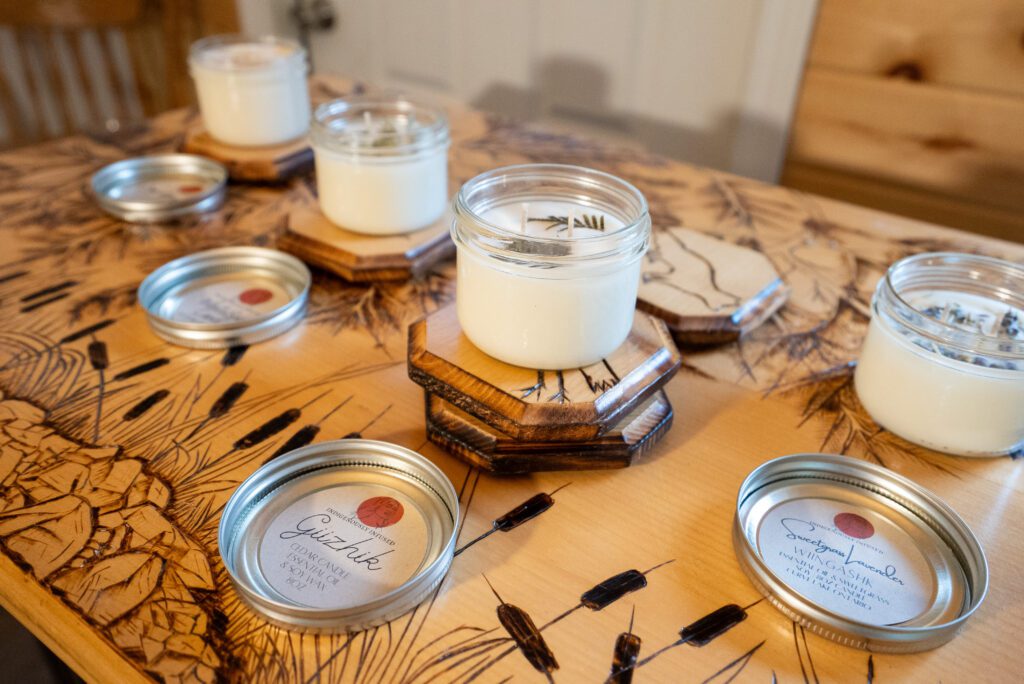 Candles infused with traditional Indigenous medicines at Indigenously Infused