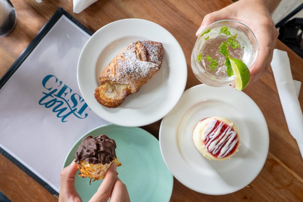 overhead shot of baked goods and a drink at c'est tout bakery and bistro