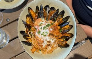 overhead shot of mussels and pasta