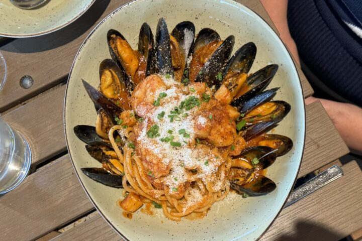 overhead shot of mussels and pasta