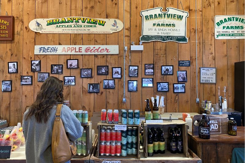 Shot of person shopping inside Brantview Apples farm shop.