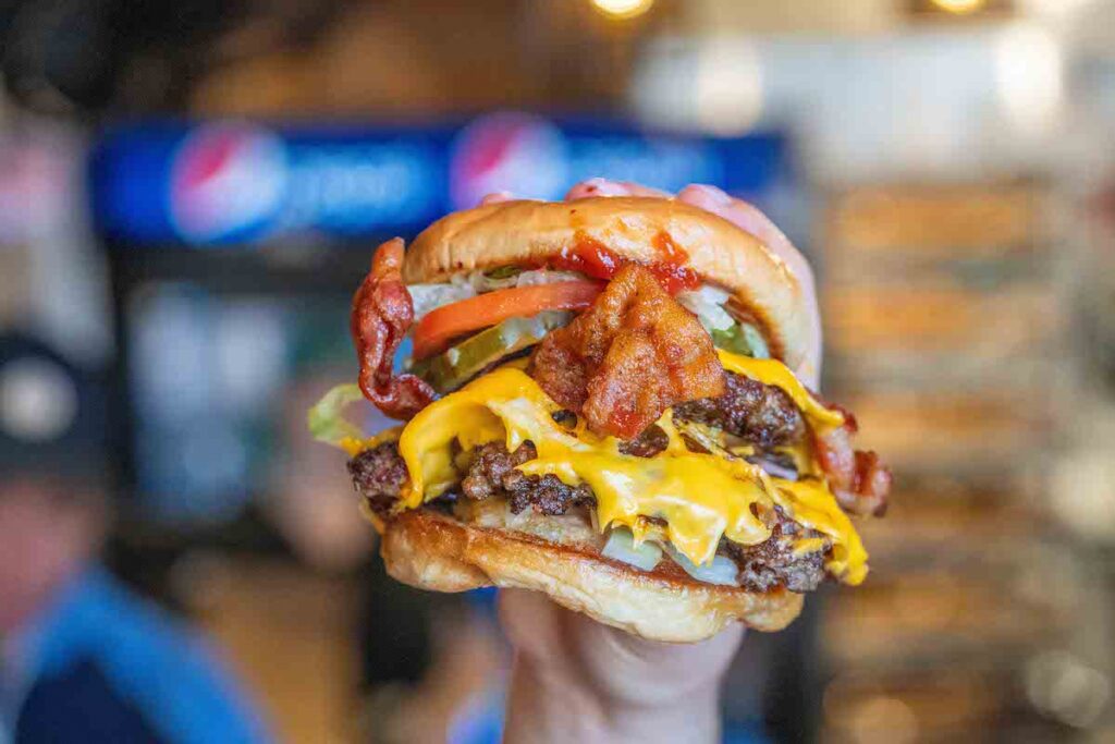 close up shot of a Richmond burger with a friend egg on top